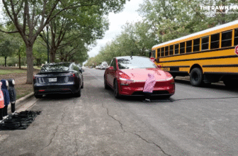 Tesla blows past stopped school bus...